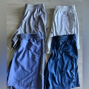 Set of Four Men's under Armour Athletic Shorts in Gray, White, Blue, and Navy XL